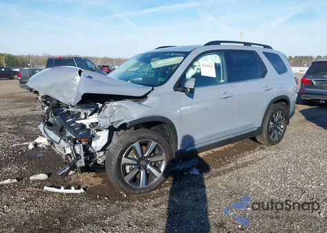 2025 Honda Pilot Touring z USA, uszkodzony, nr VIN 5FNYG1H72SB131781